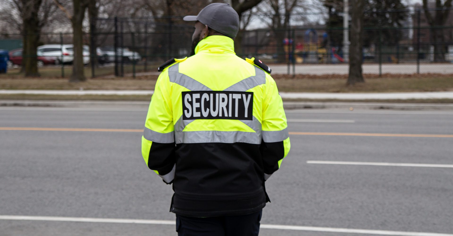 Closeup shot of a security guard watching the parking area A closeup shot of a security guard watching the parking area